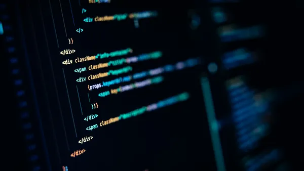 Close-up of a computer screen displaying many lines of code