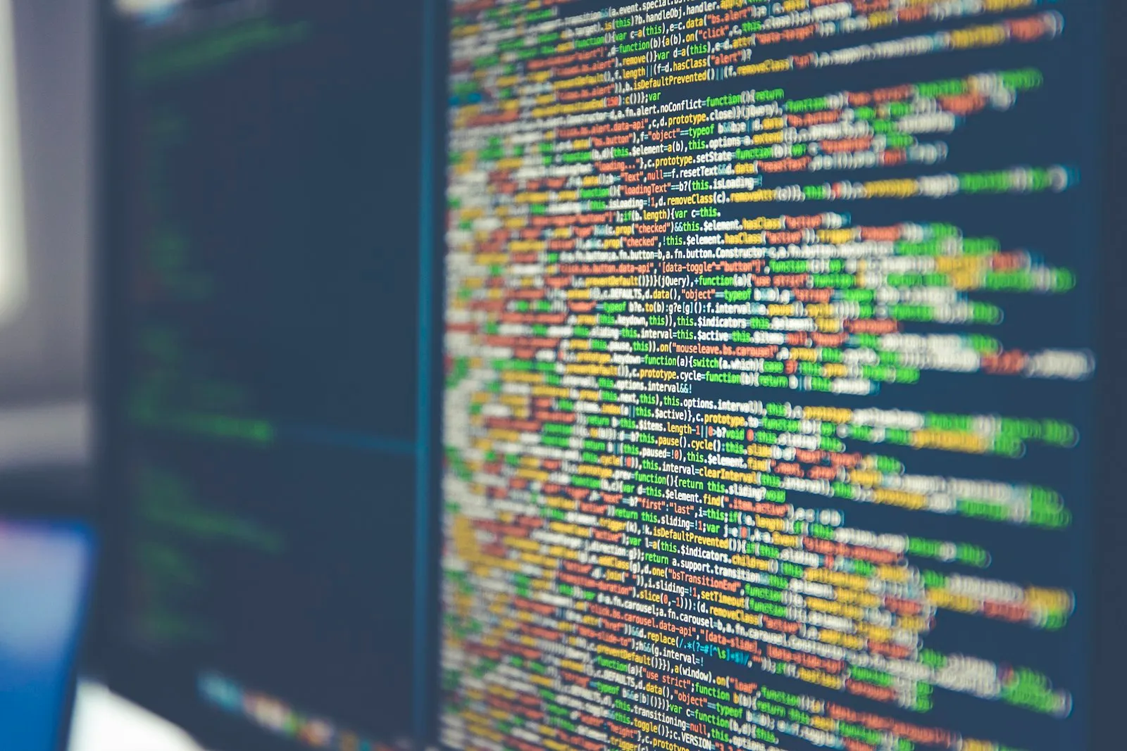 Colorful software code displayed on a computer monitor